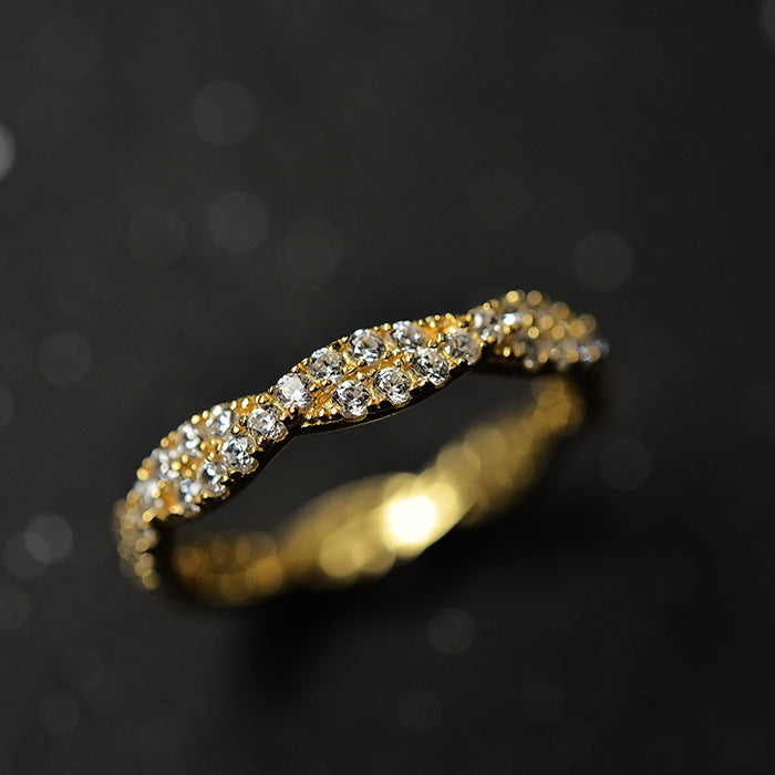 Elegant Pave Twist Eternity Wedding Band In Sterling Silver