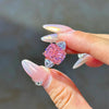 Fancy Pink Three Stone Engagement Ring Crafted in Sterling Silver