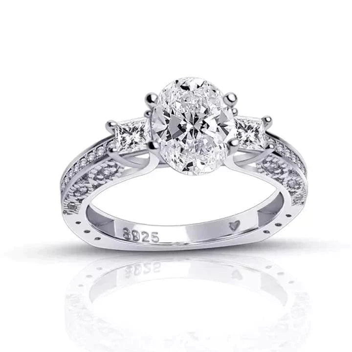 Oval Cut Engagement Ring with Two Princess Sidestones