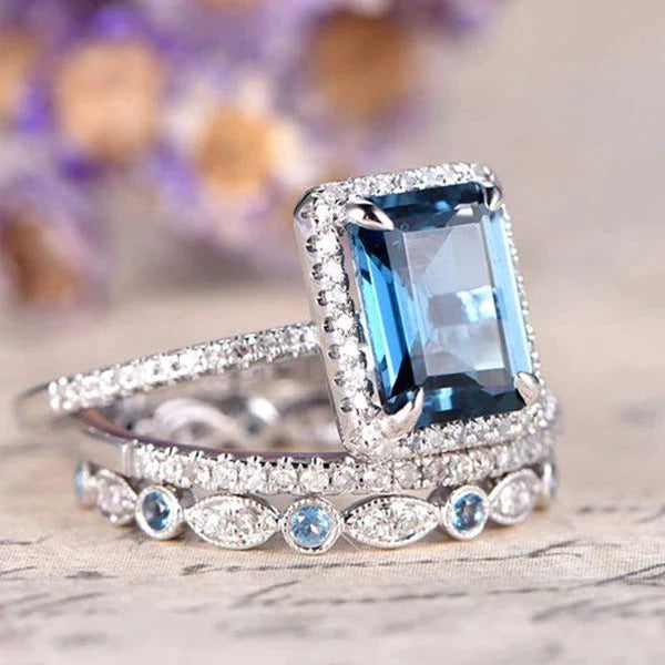 Aquamarine 3-Piece Halo Emerald Cut Sterling Silver Bridal Sets