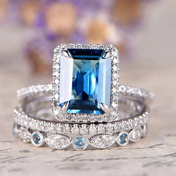 Aquamarine 3-Piece Halo Emerald Cut Sterling Silver Bridal Sets