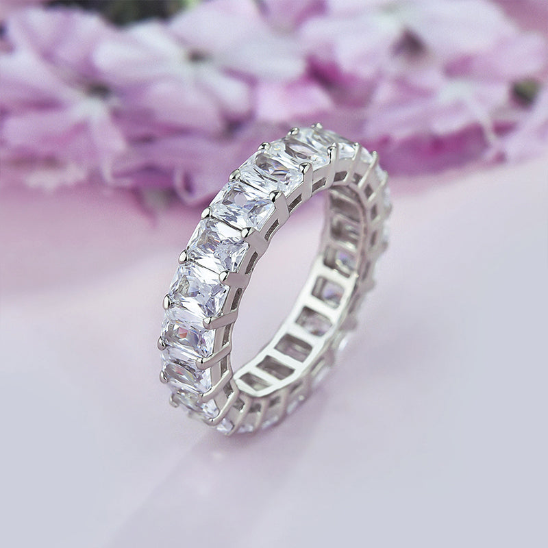 Elegant Radiant Cut Eternity Band In Sterling Silver