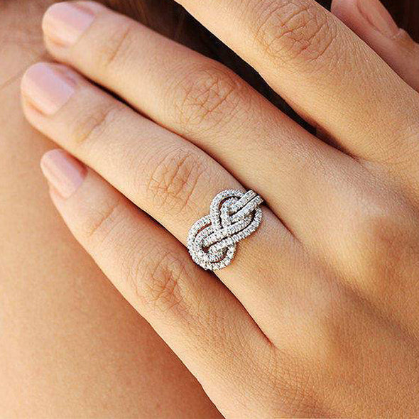 Dainty Pave Infinity Knot Design Wedding Band In Sterling Silver