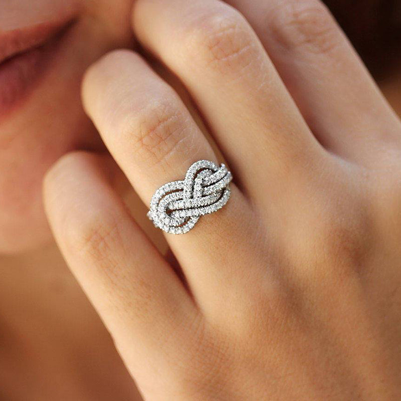 Dainty Pave Infinity Knot Design Wedding Band In Sterling Silver